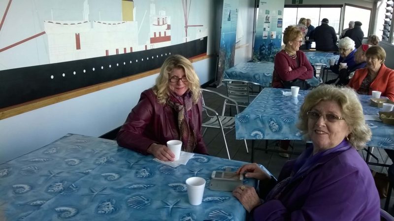 visitors to Submerged exhibition having coffee