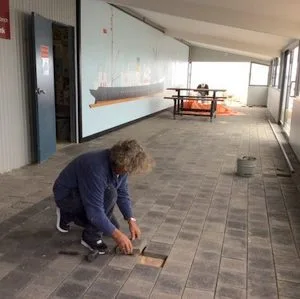 laying pavers in verandah renovation