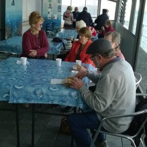 visitors enjoy fish & chips on newly renovated verandah
