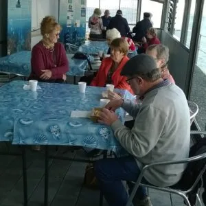 visitors enjoy fish & chips on newly renovated verandah